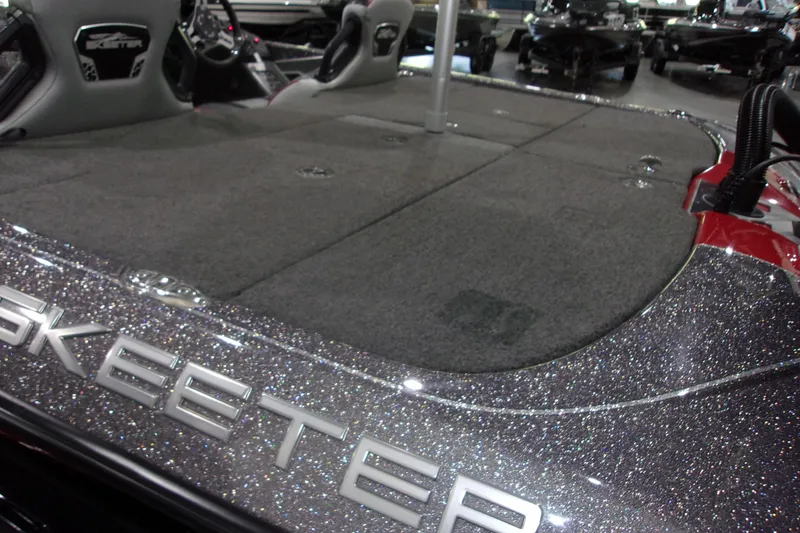 Slide: The Image of 2022 Skeeter boat interior with glitter finish and spacious seating area. - 13
