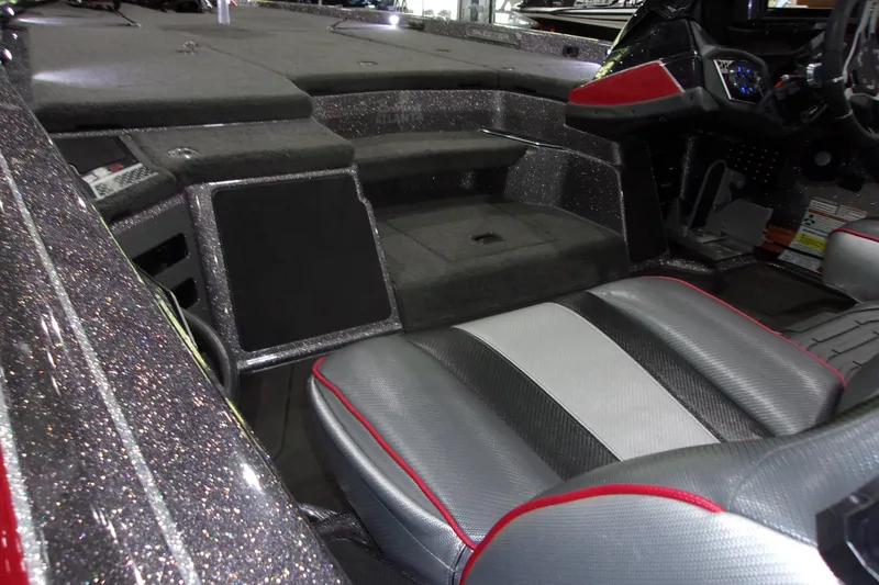 Slide: The Image of 2022 Skeeter boat interior with sleek seating and modern dashboard design. - 14