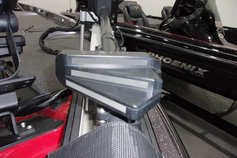 Slide: The Image of 2022 Skeeter boat interior with advanced steering mechanism and Phoenix branding. - 19