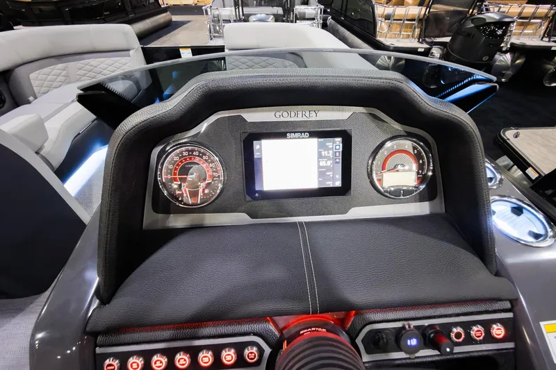 Slide: The Image of Dashboard of 2026 Godfrey Monaco 235 boat with modern controls and display. - 15