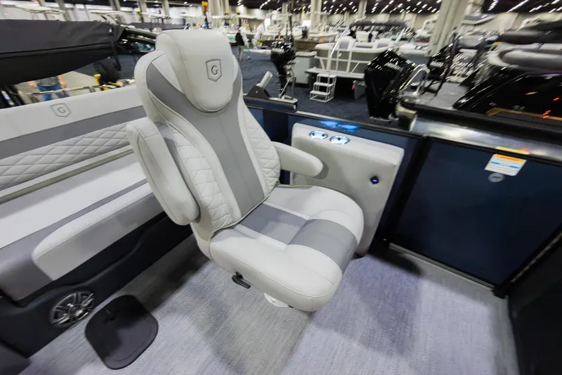 Slide: The Image of Luxurious seating on 2026 Godfrey Monaco 235 Single Flip Lounge boat, showcasing modern design. - 16