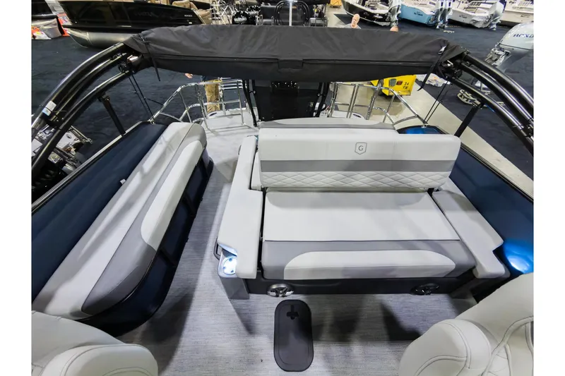 Slide: The Image of 2026 Godfrey Monaco 235 boat interior with luxurious seating and modern design. - 19