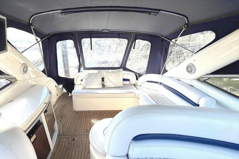Slide: The Image of Luxurious interior of 2002 Sunseeker Camargue 44 yacht with plush seating and elegant design. - 15