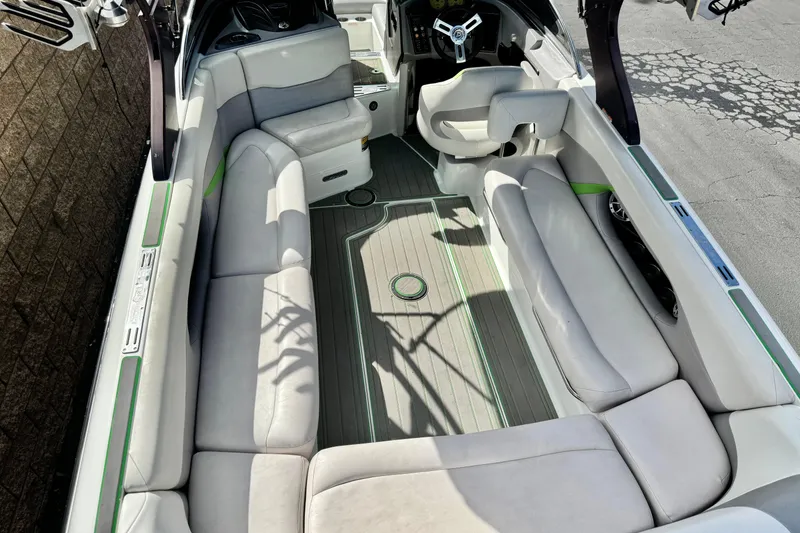 Slide: The Image of 2014 Centurion Enzo SV244 boat interior with spacious seating and modern design. - 10