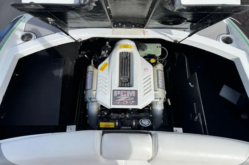 Slide: The Image of 2014 Centurion Enzo SV244 engine compartment with PCM 409 motor. - 16