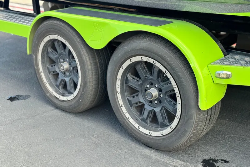 Slide: The Image of Close-up of 2014 Centurion Enzo SV244 trailer wheels with green fenders. - 17