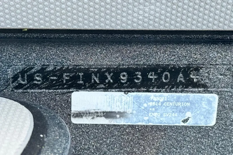 Slide: The Image of 2014 Centurion Enzo SV244 hull identification number and label detail. - 19