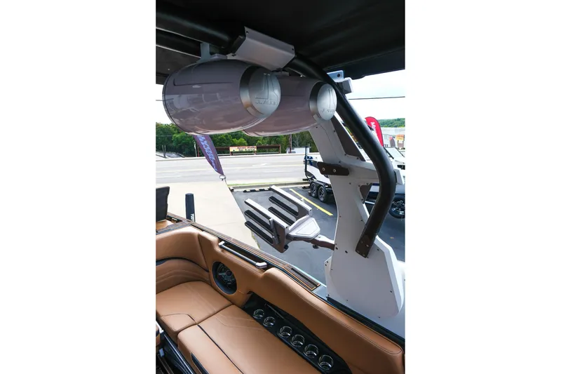 Slide: The Image of 2023 Supra SE550 boat interior with speakers and leather seating. - 13