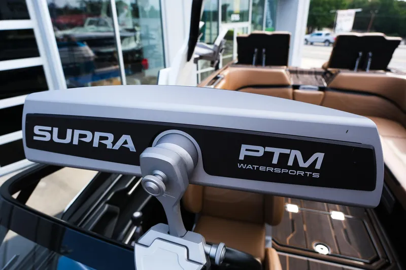 Slide: The Image of 2023 Supra SE550 boat with PTM Watersports mirror, showcasing luxury interior. - 21