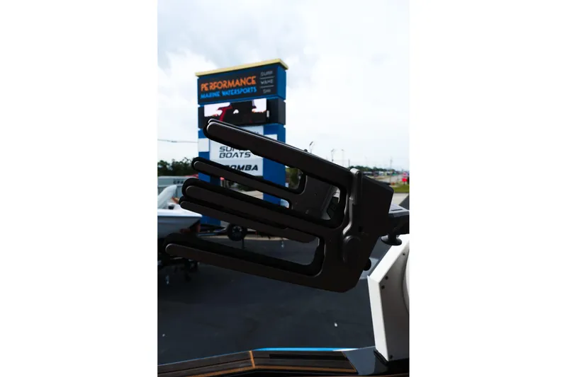 Slide: The Image of 2023 Supra SE550 boat accessory with Performance Marine Watersports sign in background. - 28