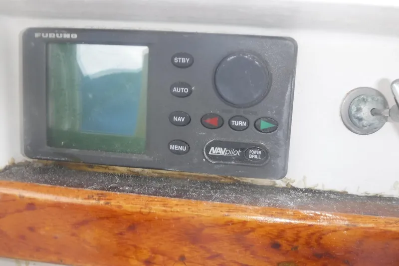Slide: The Image of Furuno NAVpilot control panel on 1989 Tartan 37 sailboat dashboard. - 20