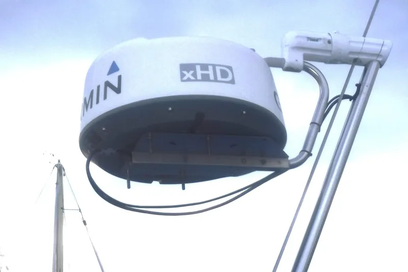 Slide: The Image of Radar equipment on a 1989 Tartan 37 sailboat, featuring Garmin xHD technology. - 7
