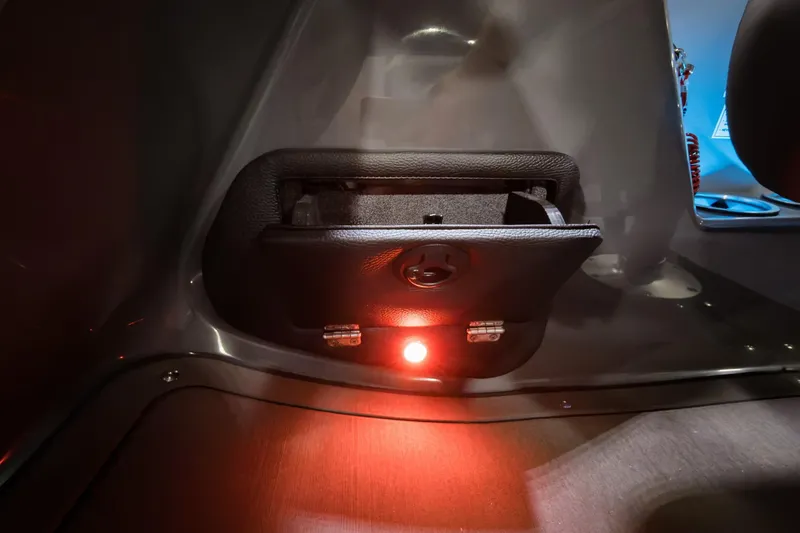 Slide: The Image of Interior view of 2026 Godfrey Monaco 25' Tritoon with illuminated storage compartment. - 17