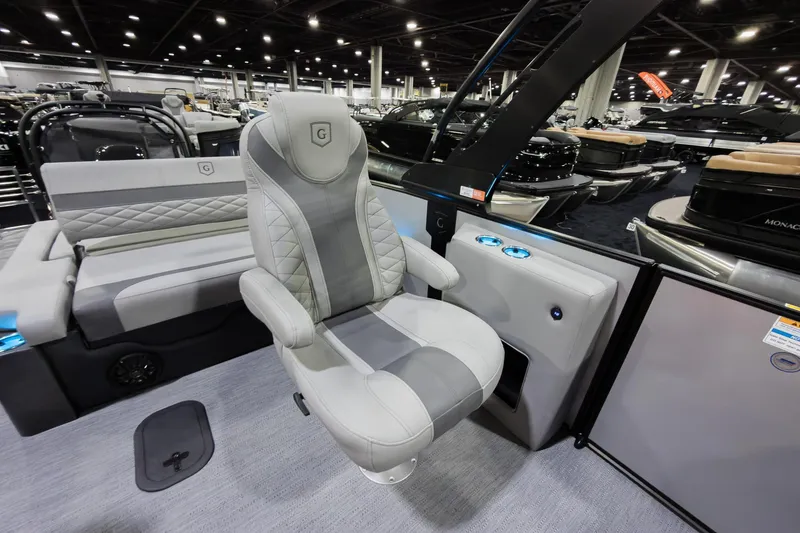 Slide: The Image of Luxurious interior of 2026 Godfrey Monaco 25' Tritoon with plush seating and modern design. - 18