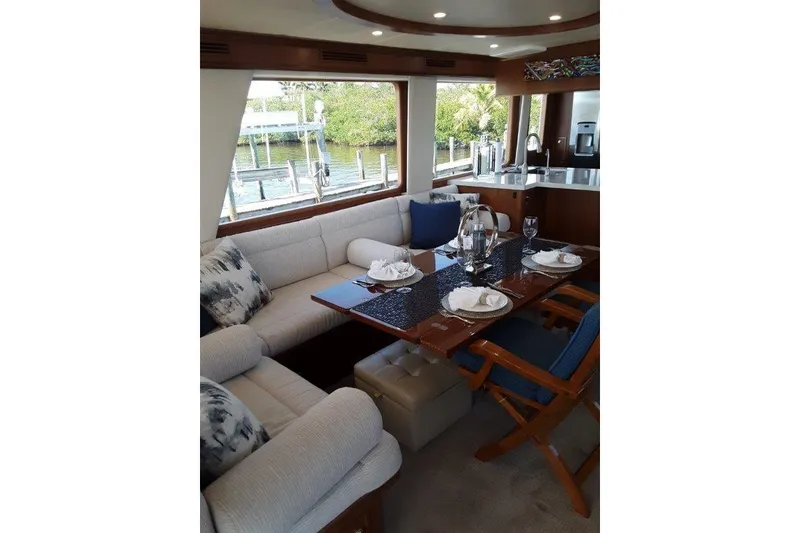 Slide: The Image of Luxurious interior of 2008 Offshore Yachts 62 Flushdeck, featuring elegant dining area - 15