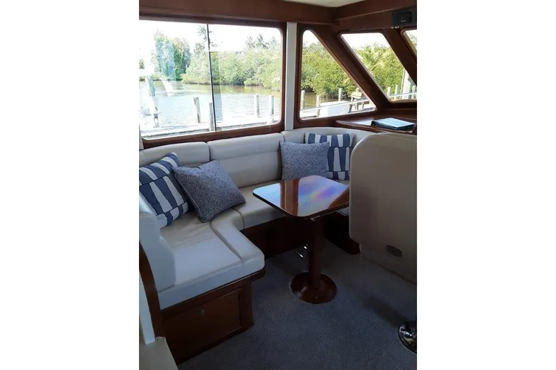 Slide: The Image of Interior by the inside helm with cozy seating and table - 23