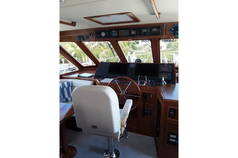 Slide: The Image of Inside helm with modern navigation equipment and comfortable seating. - 27