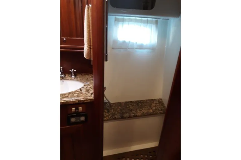 Slide: The Image of Day Head shower accessed by the forward VIP stateroom and common area - 44