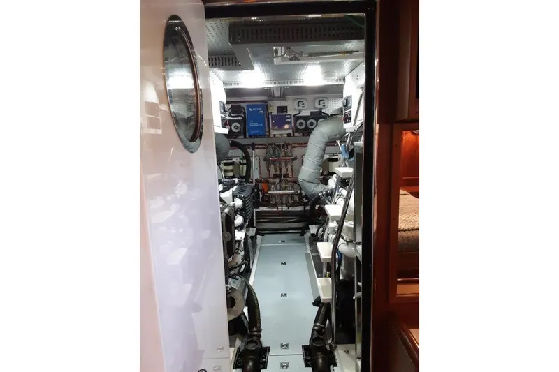 Slide: The Image of Engine room of 2008 Offshore Yachts 62 Flushdeck, showcasing mechanical systems and equipment. - 49
