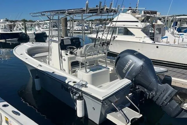 The Image of 2022 Parker 2100 Special Edition boat docked with Yamaha outboard motor. - 0
