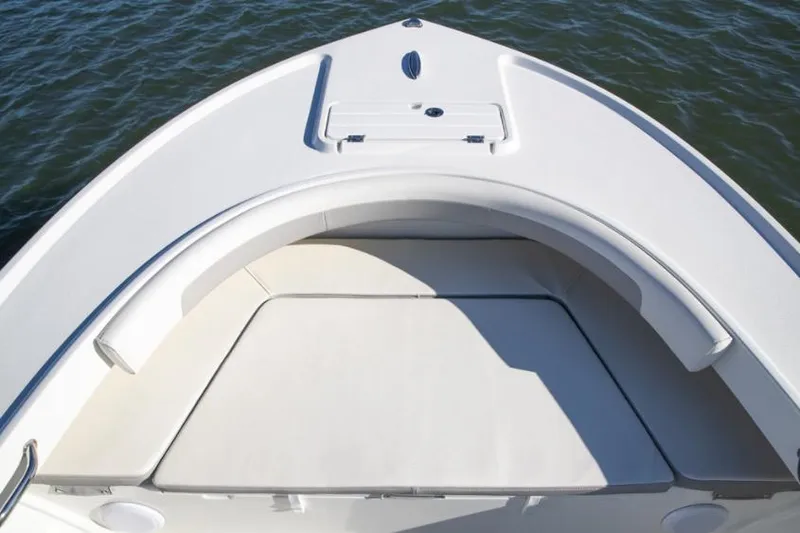 Slide: The Image of Manufacturer Provided Image: Bow seating area of 2022 Parker 2100 Special Edition boat on water. - 3