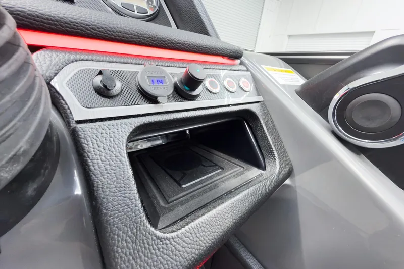 Slide: The Image of Control panel of 2026 Godfrey Monaco 25' Tritoon with USB port and buttons. - 27