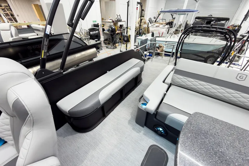 Slide: The Image of Luxurious interior of 2026 Godfrey Monaco 25' Tritoon with modern seating and sleek design. - 38