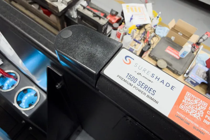 Slide: The Image of SureShade 1500 Series Premium Power Bimini on Godfrey Monaco 25' Tritoon, 2026 model. - 59