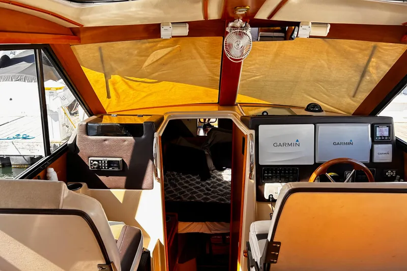 Slide: The Image of Interior of a 2014 Cutwater C-28 boat with Garmin navigation system. - 14