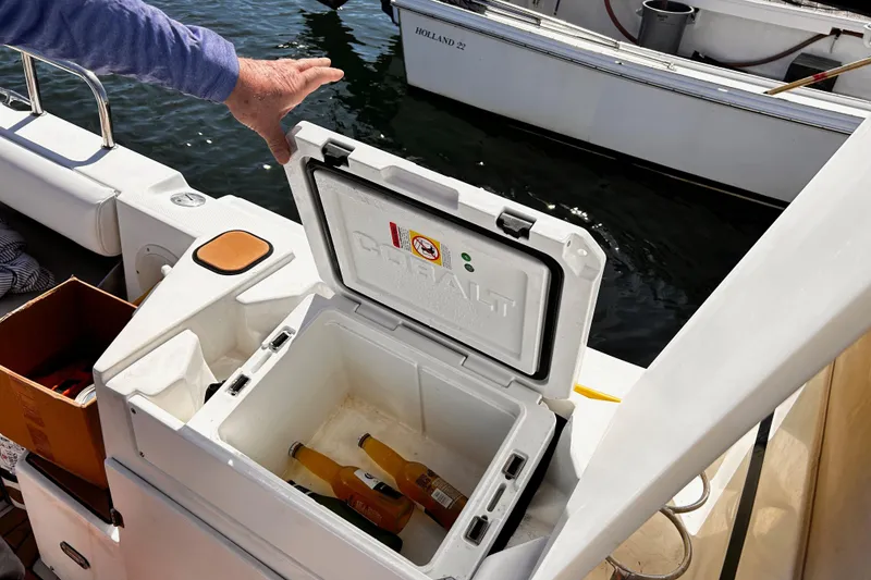 Slide: The Image of Open cooler with drinks on a 2014 Cutwater C-28 boat deck. - 24