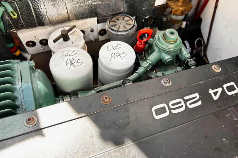 Slide: The Image of Engine compartment of a 2014 Cutwater C-28 boat, featuring D4 260 components. - 35