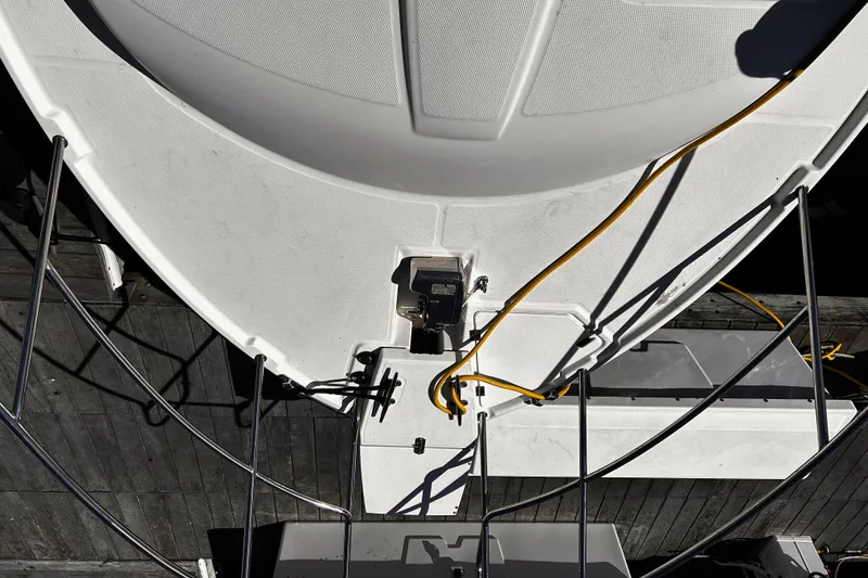 Slide: The Image of Overhead view of 2014 Cutwater C-28 boat deck with railing and yellow cable. - 4