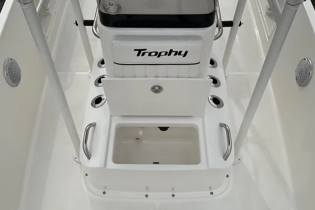 Slide: The Image of 2025 Bayliner Trophy T18 boat interior with seating and storage compartments. - 10