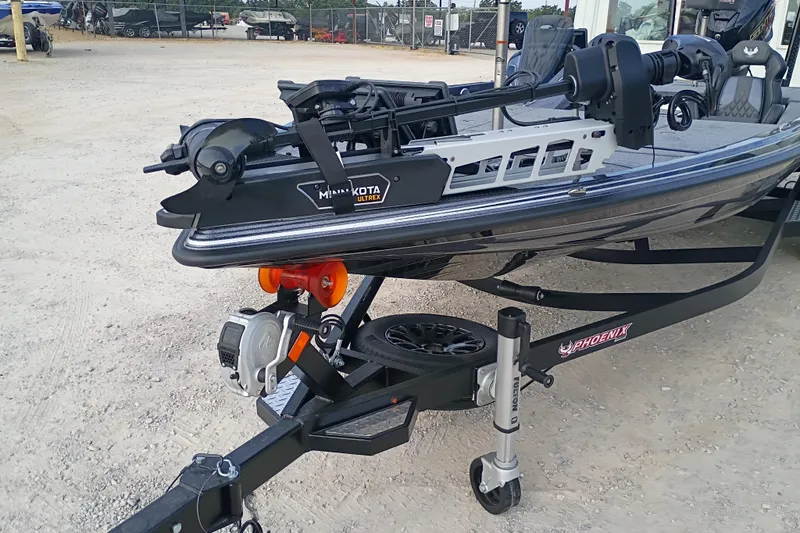 Slide: The Image of 2026 Phoenix 921 ELITEX boat with Minn Kota Ultrex motor on trailer. - 3