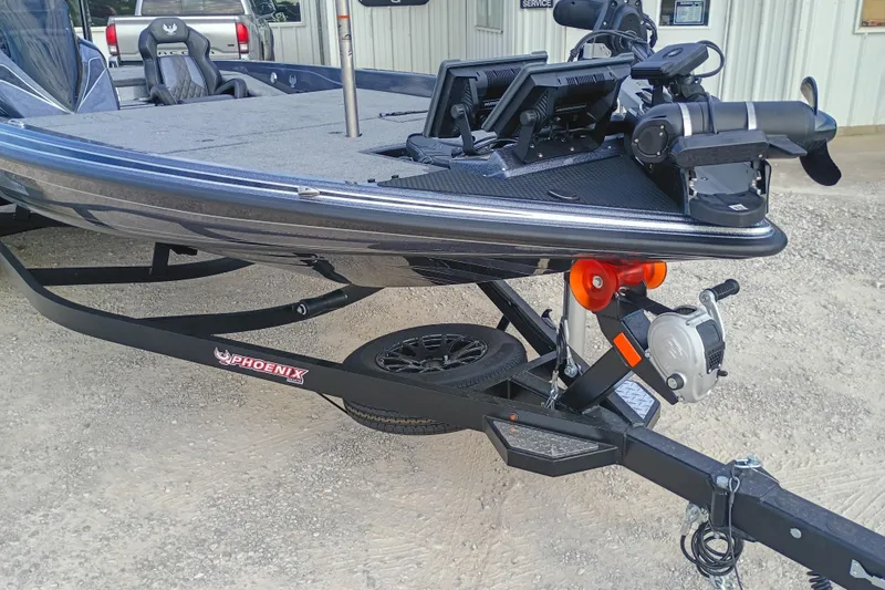 Slide: The Image of 2026 Phoenix 921 ELITEX boat on trailer, featuring advanced equipment and sleek design. - 4