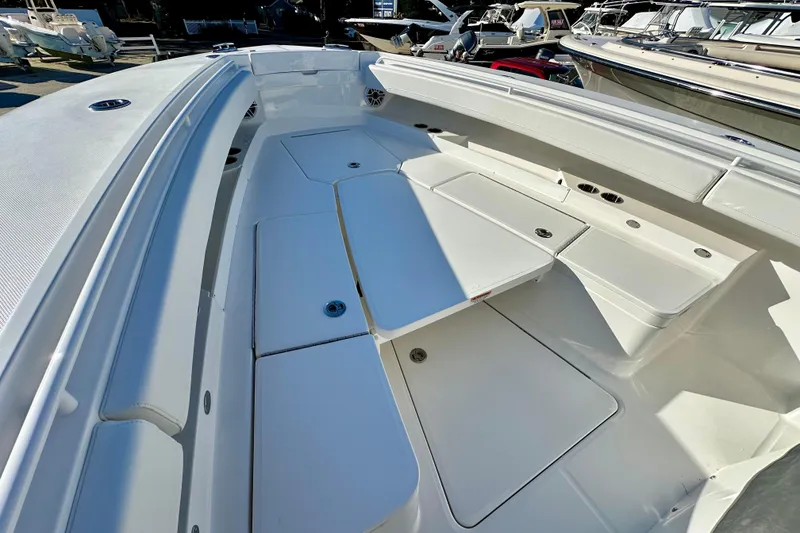 Slide: The Image of 2026 Regulator 31 boat interior with spacious seating and storage compartments. - 18