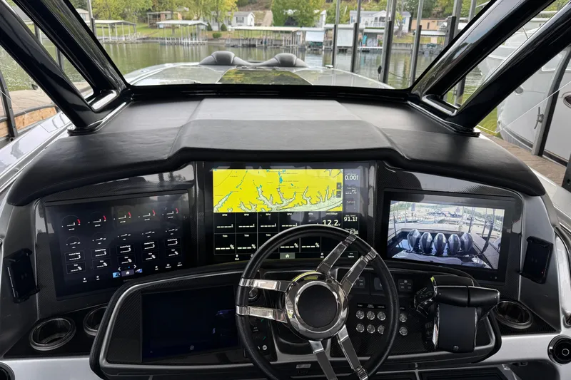 Slide: The Image of 2024 MTI 50v interior with illuminated blue panel and sleek design. - 11