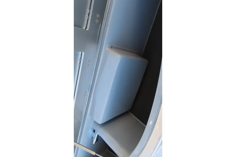 Slide: The Image of 2024 MTI 50v boat cockpit with advanced navigation screens and controls. - 26