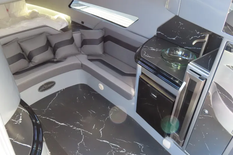 Slide: The Image of 2024 MTI 50v boat exterior with sleek design and modern detailing. - 29