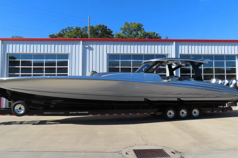 Slide: The Image of 2024 MTI 50v boat interior with luxurious seating and modern design. - 34