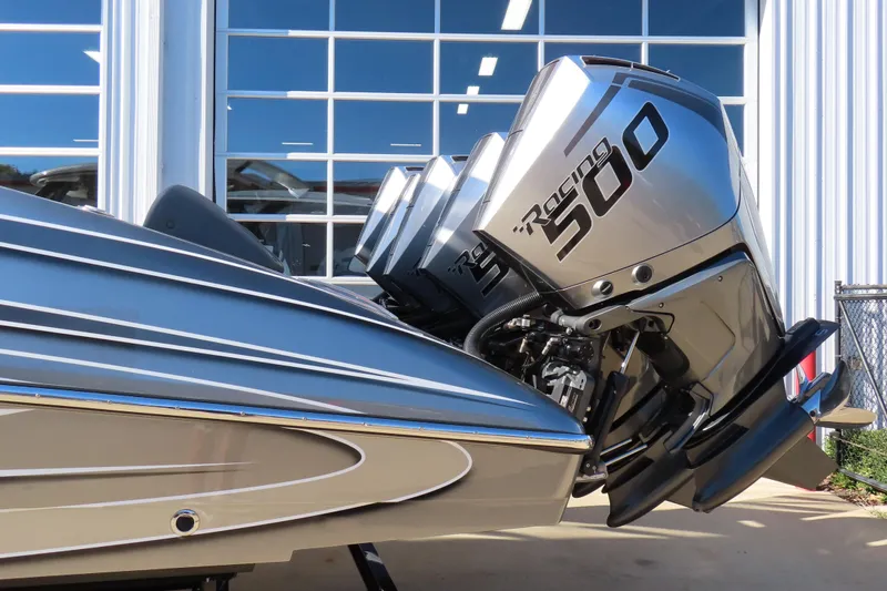 Slide: The Image of 2024 MTI 50v boat interior, featuring open storage compartments and 25th anniversary design. - 37