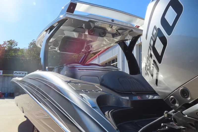 Slide: The Image of 2024 MTI 50v boat speakers and lights on deck, outdoor setting. - 38