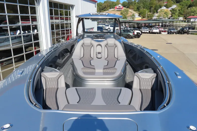 Slide: The Image of Luxurious interior of 2024 MTI 50v with cup holders and speaker detail. - 44