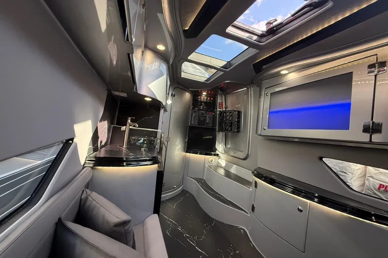 Slide: The Image of Luxurious interior of 2024 MTI 50v boat with modern amenities and sleek design. - 55
