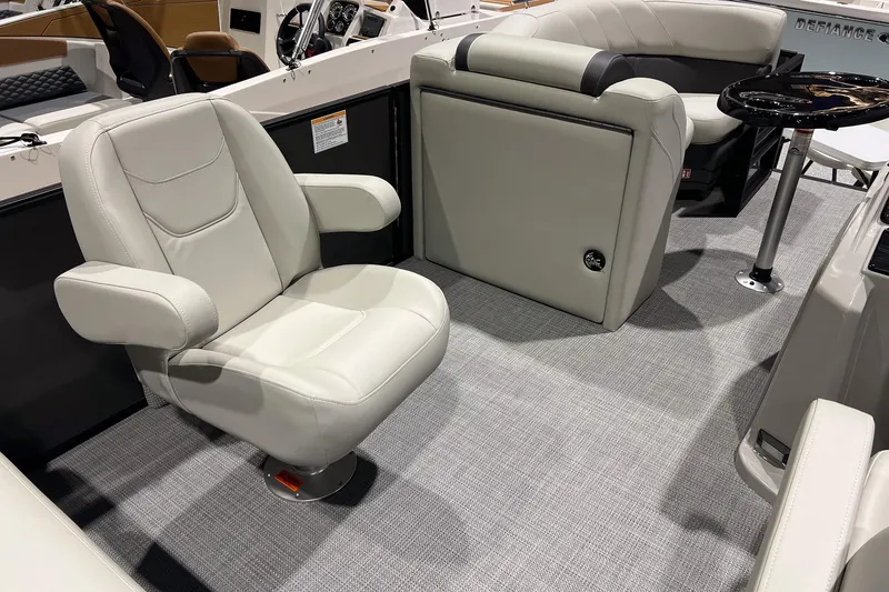 Slide: The Image of 2026 Sylvan Mirage 820 CLZ DH boat interior with plush seating and modern design. - 13
