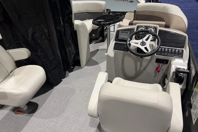 Slide: The Image of Interior of 2026 Sylvan Mirage 820 CLZ DH boat with modern helm and seating. - 15