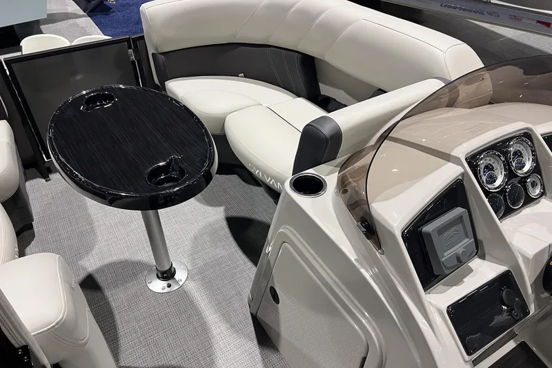 Slide: The Image of Interior of 2026 Sylvan Mirage 820 CLZ DH boat with seating and control panel. - 19