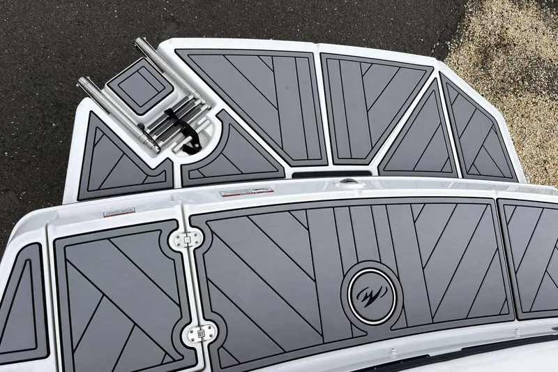Slide: The Image of 2023 Monterey M-22 boat deck with sleek gray panels and integrated ladder. - 20