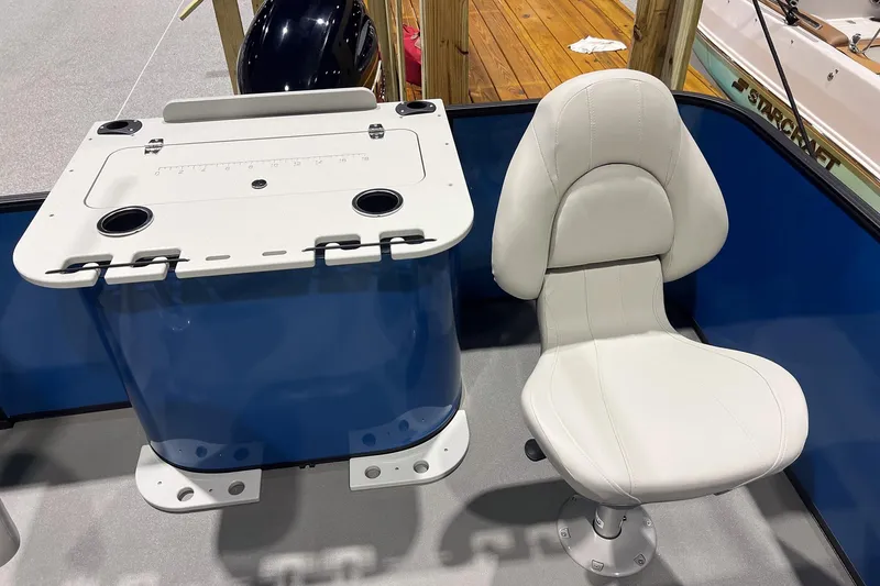 Slide: The Image of White seat and table on Sylvan Mirage Fish 820 Party Fish boat, 2026 model. - 13