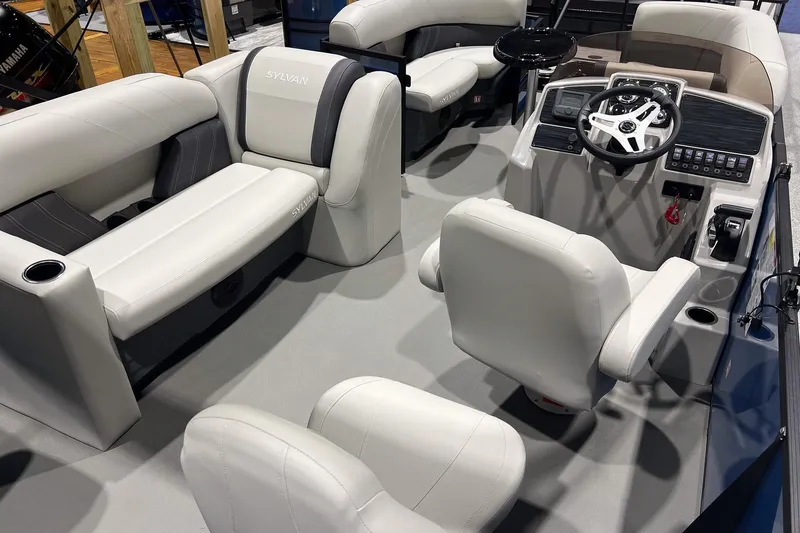 Slide: The Image of 2026 Sylvan Mirage Fish 820 Party Fish interior with plush seating and modern helm. - 5